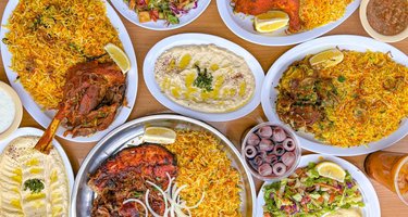 Hadramout Restaurant signature dishes Lamb MandiHanith (Slow-Roasted Lamb)Chicken KabsaSaltah